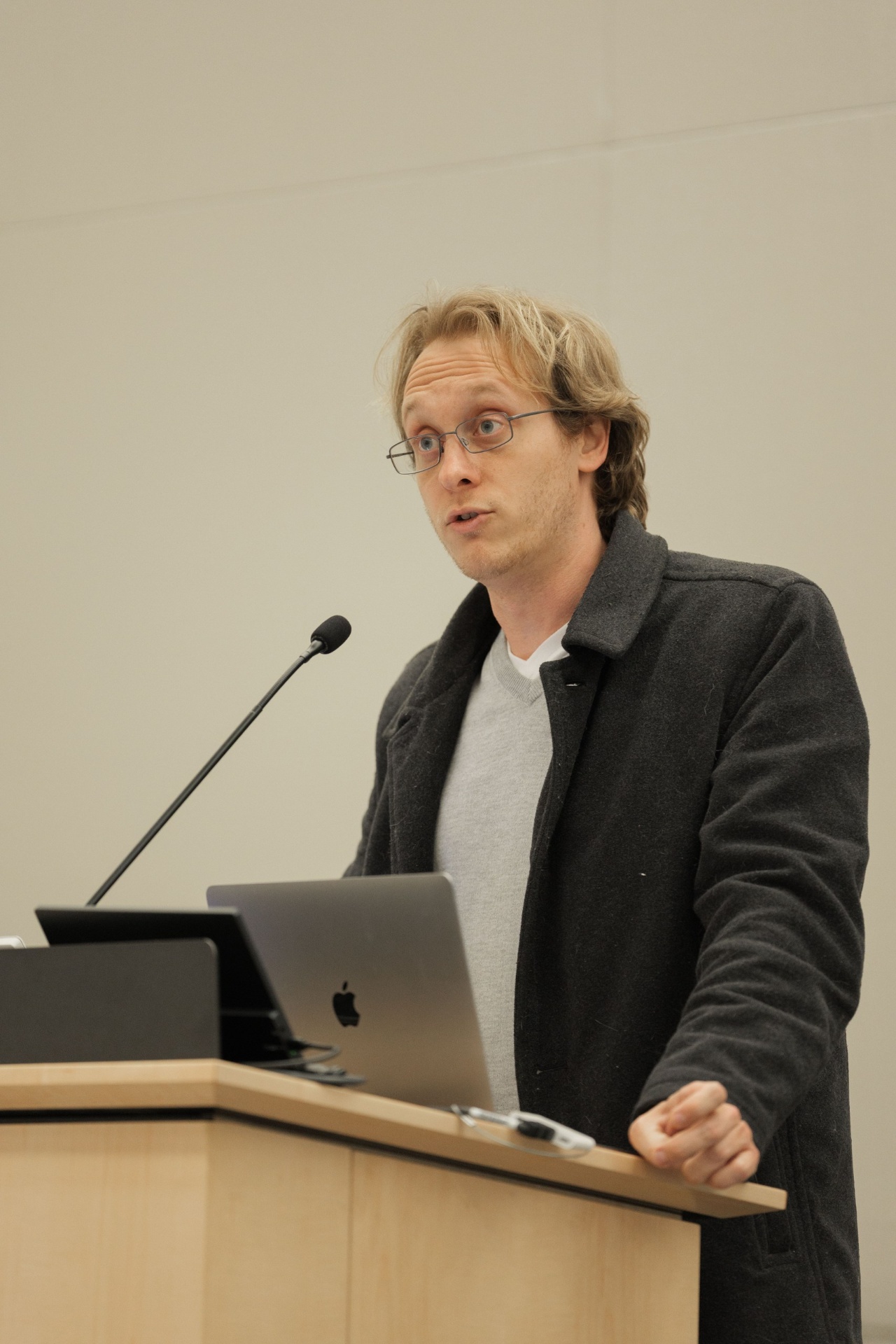 Capital Day speaker presenting from the podium at UC Law