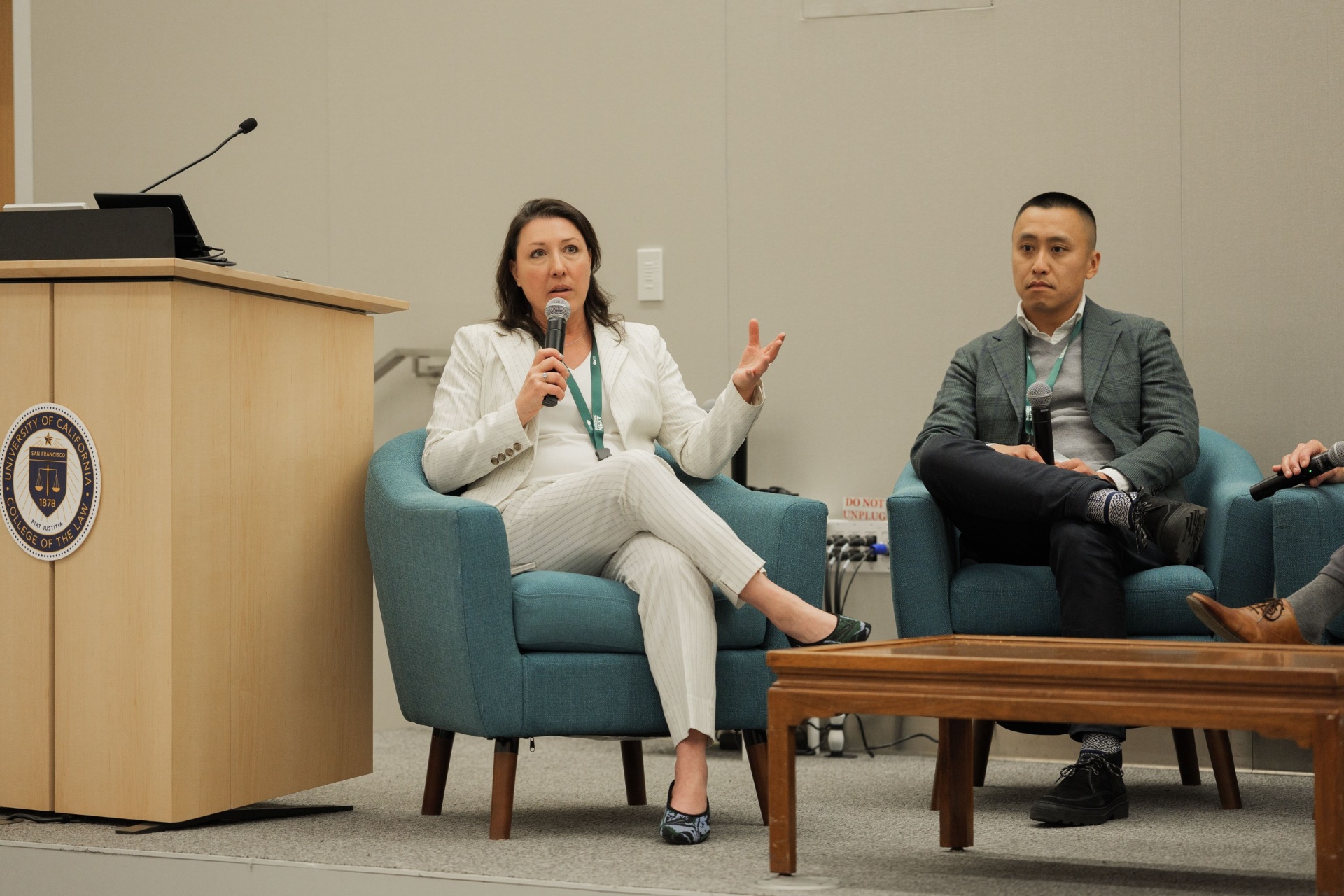 Diana Sankovic of Diosan Capital speaking from the panel chair next to Adam E. Bergman during the Capital Day debt panel at UC Law SF