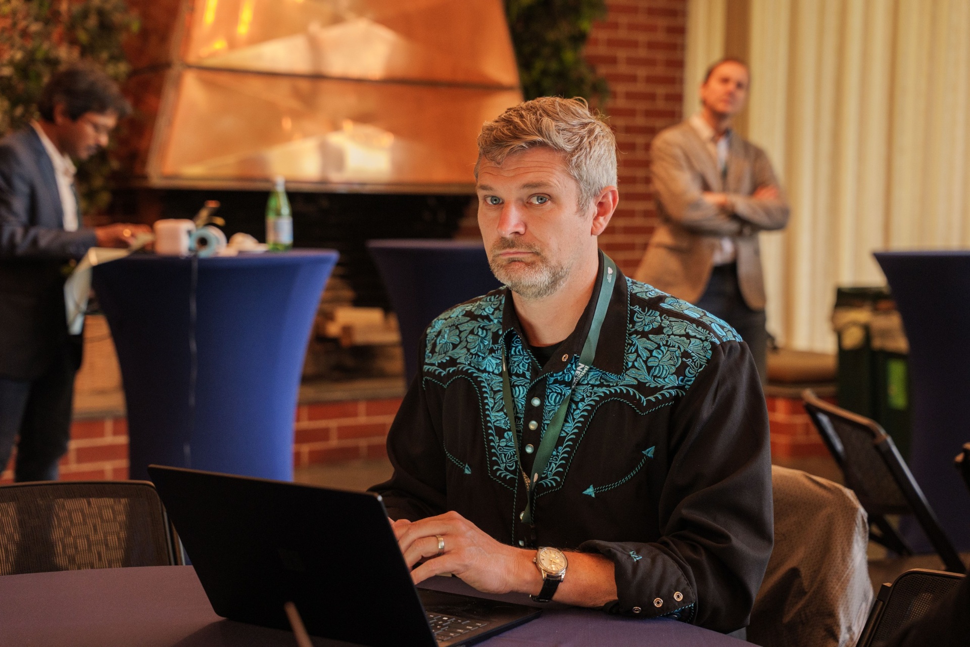 Delegate working on laptop at the venue